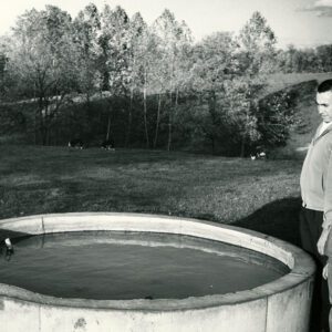 October 10, 1966 Arthur Morris and his son, Jeff, at their newly constructed spring development tank