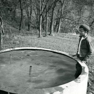 10_23_1960_Tom_Mills_at_the_spring_development_tank__ThOctober 23, 1960. Tom Mills at the Spring Development Tank at Thaburn Brittan Farm in Noble Countyaburn_Brittan_Farm_in_Noble_Co._website-1265