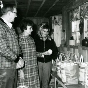 October 23, 1970 Kenneth Burrer Apple Sales Room. Mrs. Kenneth Burrer (right) shown with customers