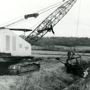 December 7, 1968. Robert Wilson observes as Jack Butler continues excavation of the Holmes Group Outlet Ditch Project/ It was an A.C.D. cost-shared job.
